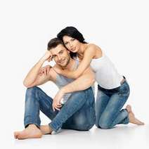  Young couple posing in jeans