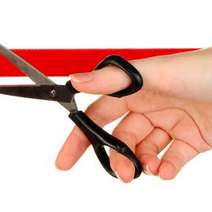  Scissors cutting the red tape