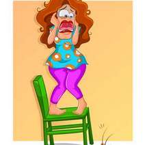 Cartoon of a scared woman standing on a chair 
