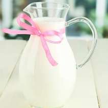  A jar of water with a pink ribbon