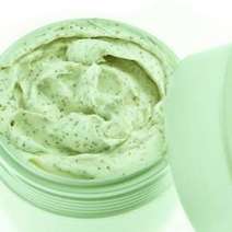  A jar full of green facial cream or peeling