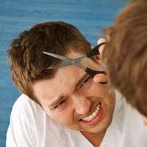  A man cutting his hair