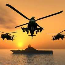  Army helicopters flying over a ship