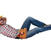  Handy man lying with hands behind his head