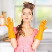  Woman wearing orange rubber gloves