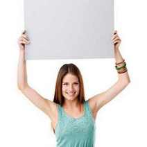  A girl holding a blank sign