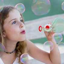  A girl with a bubble blower