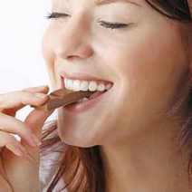  A woman eating chocolate