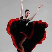  A female dancer in black and red dress