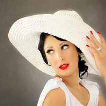 A woman in white hat