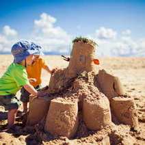  Kids building a castle out of sand