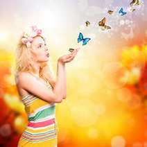 Woman blowing out butterflies