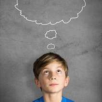 Boy with a bubble drawn above his head