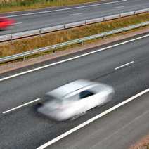 Fast car on a highway 