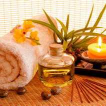  A towel, oil, palm and burning candle
