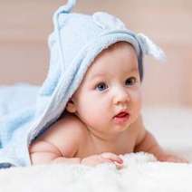  A baby with a hoody towel