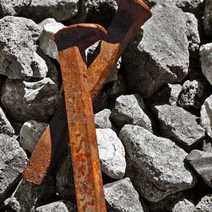 Wooden poles on rocks