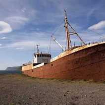 Boat on desert beach