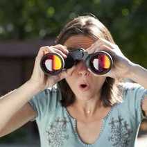 A girl looking through the binoculars