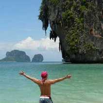 A guy enjoying a nice beach view