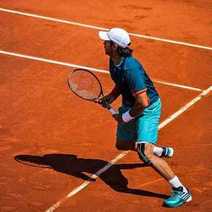 A guy playing tennis