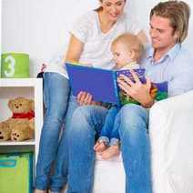 Parents reading a book with their kid