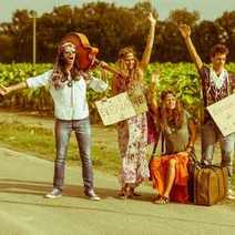  A group of young people dressed in hippie style