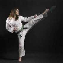 A girl performing a karate kick