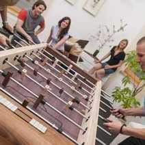 People playing Foosball