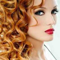 A redheaded girl with curly hair