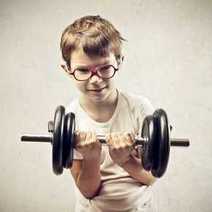  A boy trying to lift weight