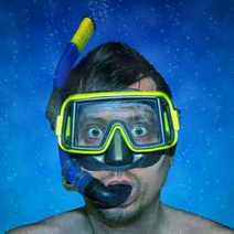  A man with a snorkel and goggles