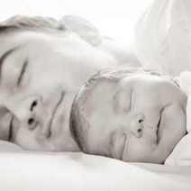  A man and baby sleeping