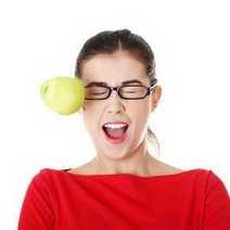  A tennis ball hitting a woman's head and glasses