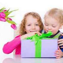 Boy and girl with a big gift box