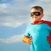 A boy in a hero costume